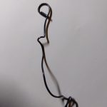 a double loop wire tie. Feb 18