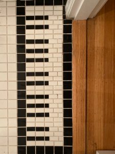 The black and white piano key motif is Karla’s work (Installed in Jon’s music studio bathroom circa 1995).