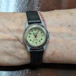 A Sharp. Waterproof to 100 feet. Battery operated. Japanese Movement. I've had it for many years . It's 2nd hand given to me by someone in my classes. Old Trusty.! I've not taken it into 100 feet of water!!! Yet.