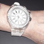 I was wearing a plain silvery watch but the battery just died, so this is my backup. It flashes all different colors on command. But I really would prefer a watch face with numbers. I have scavenged one I like, but it needs a band.