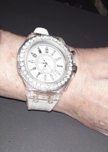 I was wearing a plain silvery watch but the battery just died, so this is my backup. It flashes all different colors on command. But I really would prefer a watch face with numbers. I have scavenged one I like, but it needs a band.